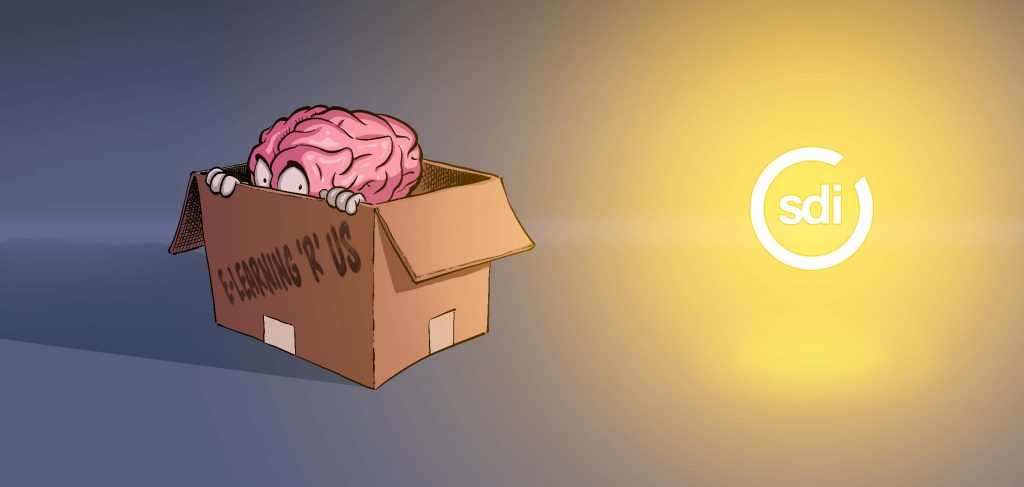 brain hiding in a box with sdi logo shining light on it