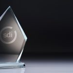 An award with an SDI logo on a black background - training and talent development